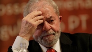 Former Brazilian President Luiz Inacio Lula da Silva gestures during the inauguration of the new National Directory of the Workers' Party, in Brasilia